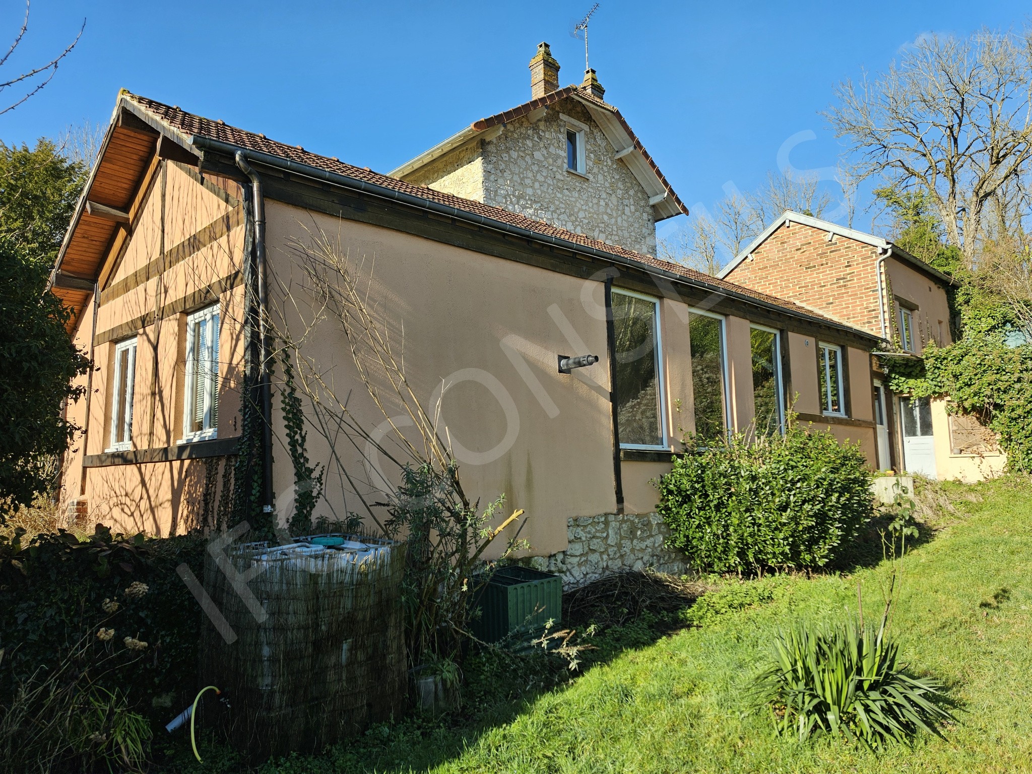 Ensemble immobilier composé de 3 logements et un terrain constructible — photo 15