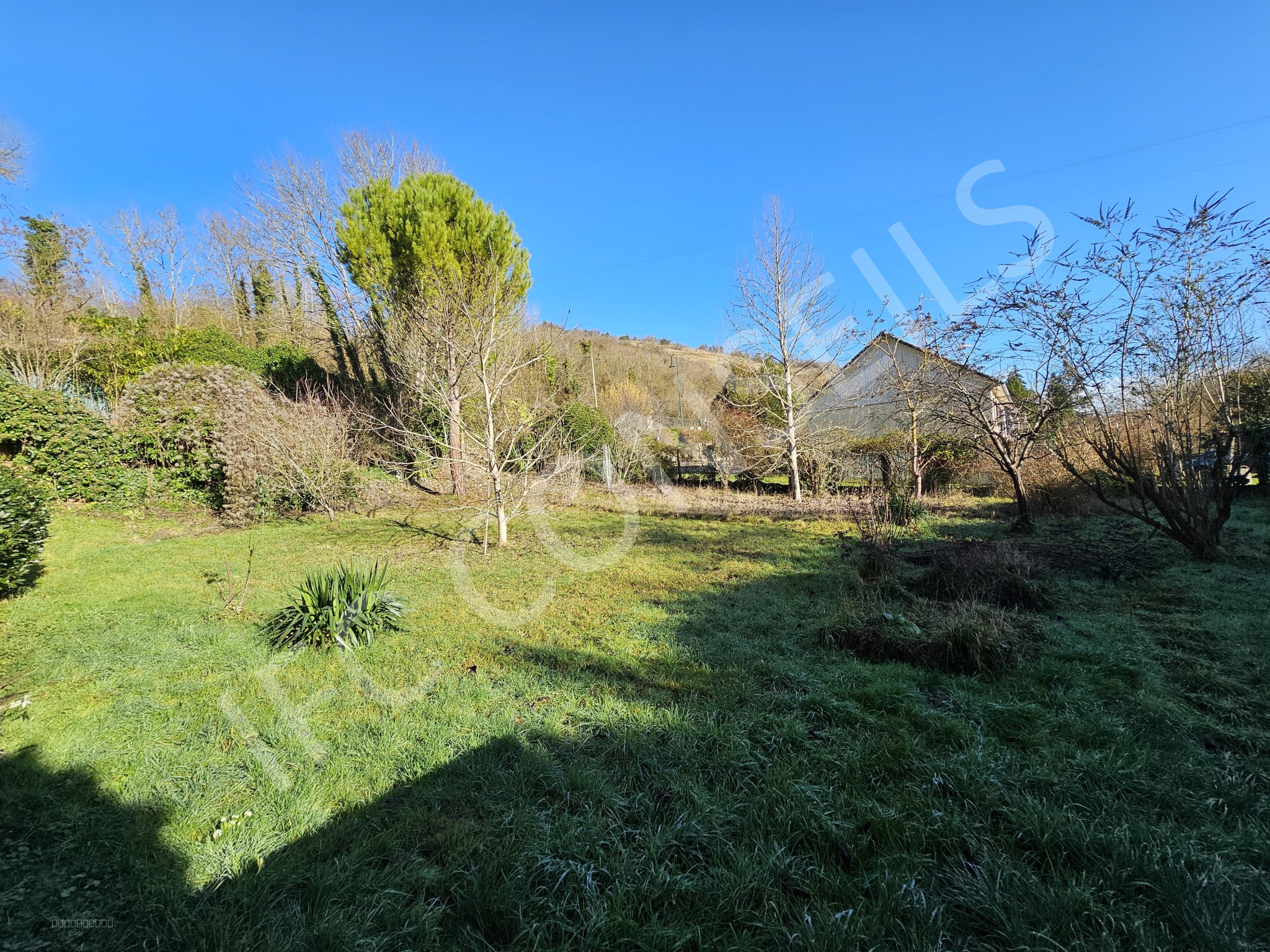 Ensemble immobilier composé de 3 logements et un terrain constructible — photo 16