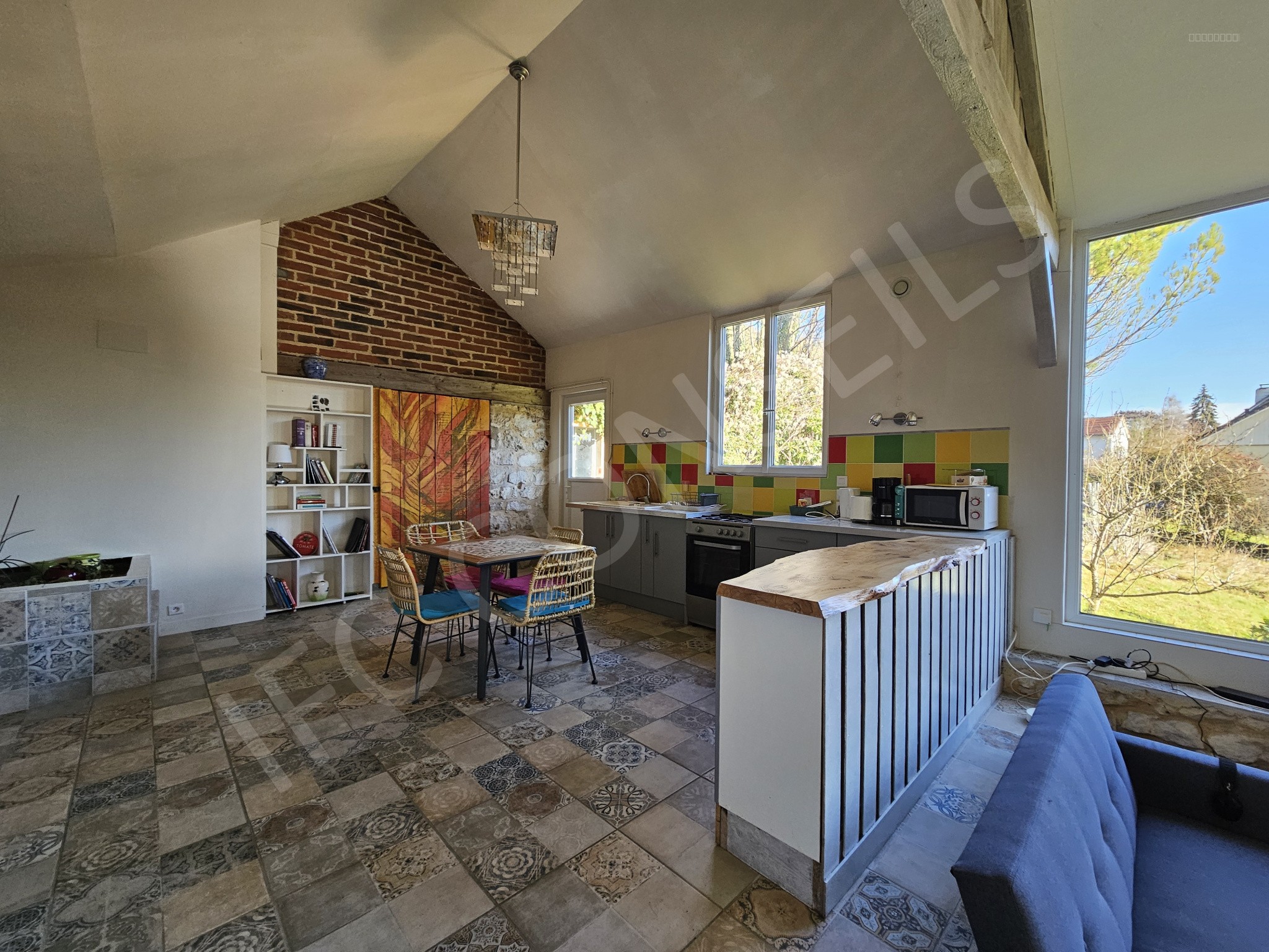 Ensemble immobilier composé de 3 logements et un terrain constructible — photo 3