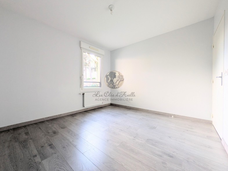 Appartement T3 avec terrasse et verdure au cœur de Saint-Genis-Laval   Résidence Harmonie Nature de 2016 — photo 13