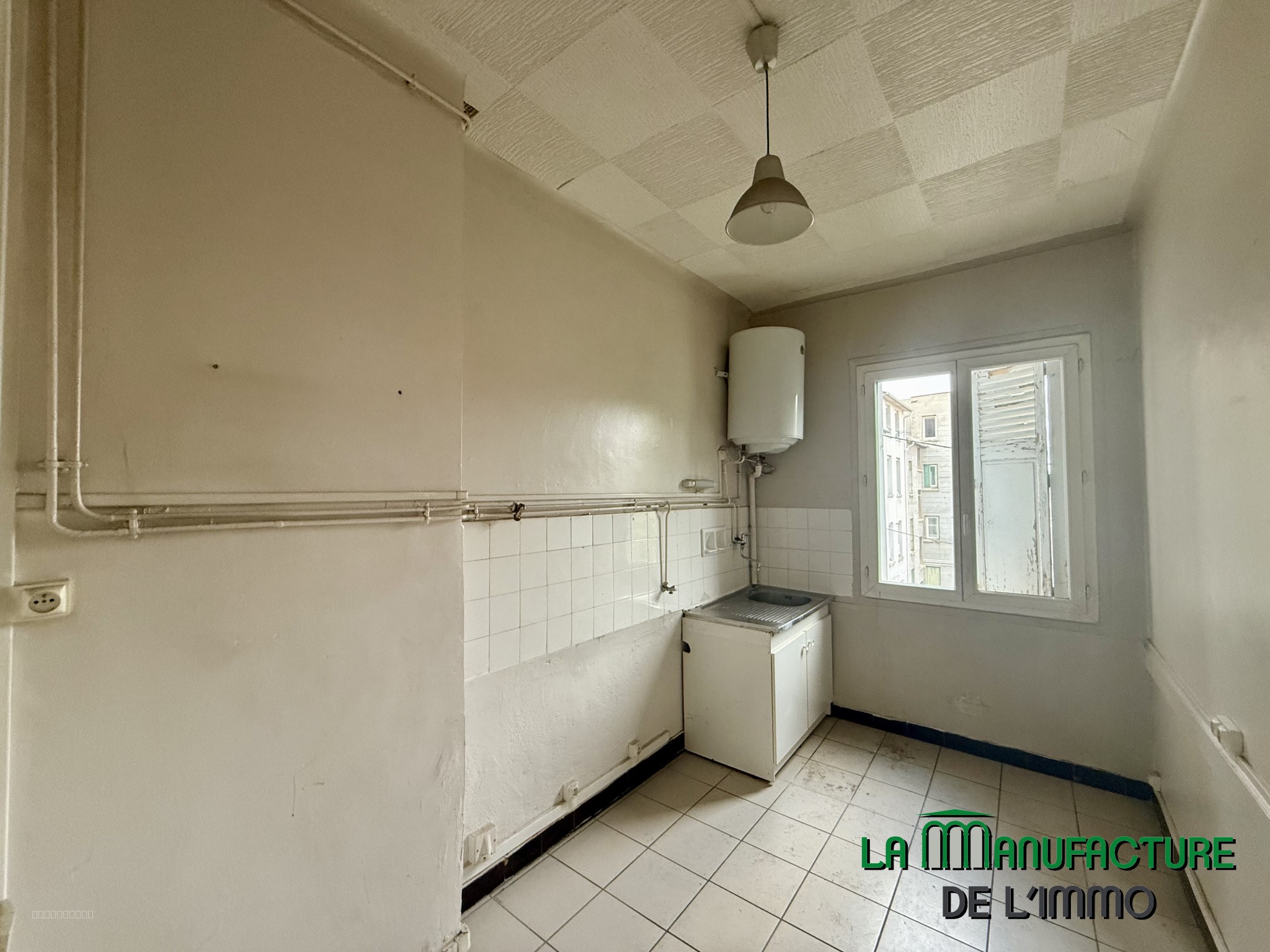 IDEAL INVESTISSEURS - IMMEUBLE DE RAPPORT DE 3 LOGEMENTS F2 / CHATEAUCREUX-PROX. CENTRE VILLE — photo 12