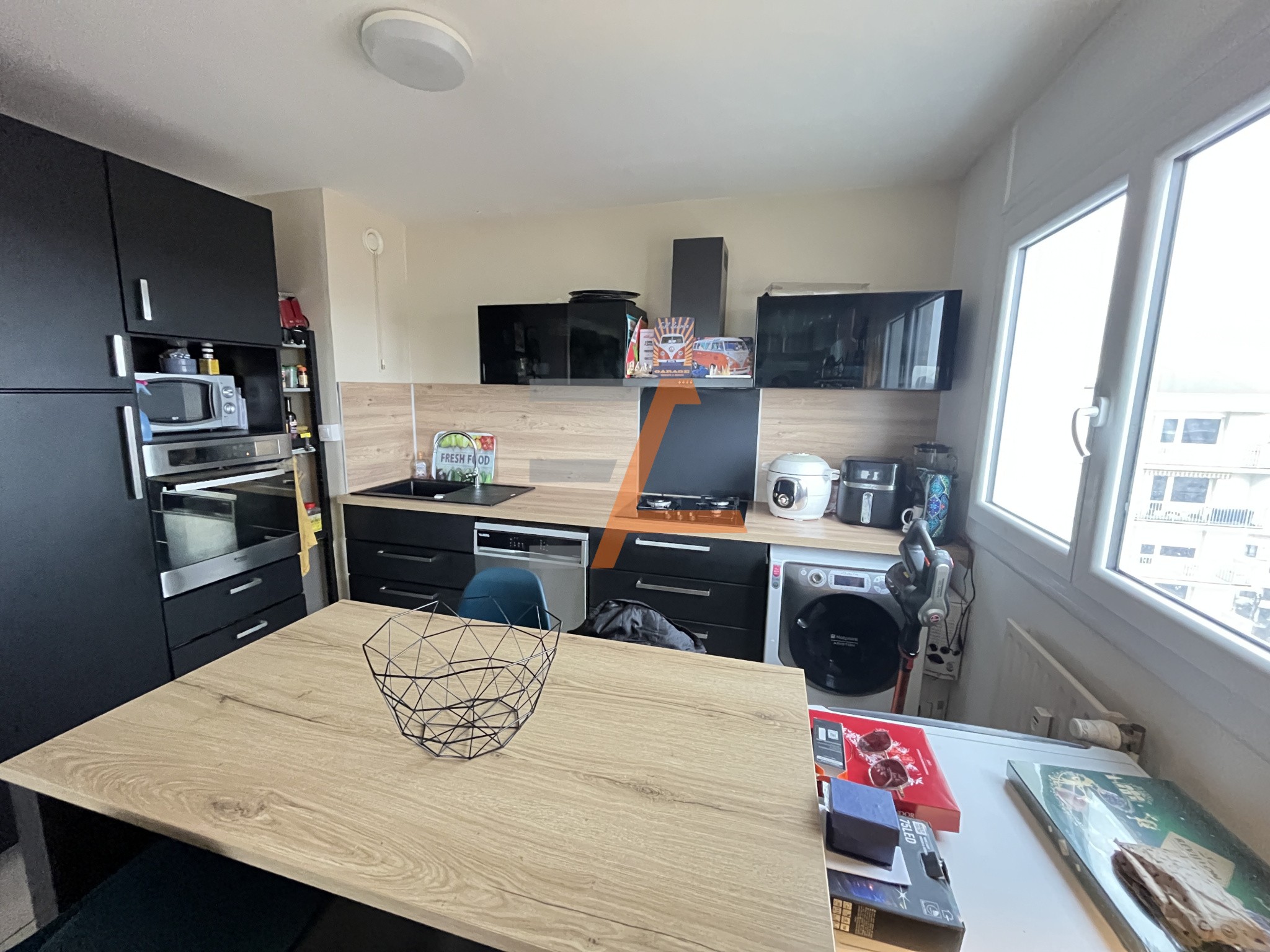 T3 avec balcon ascenseur garage et place de parking couverte — photo 2